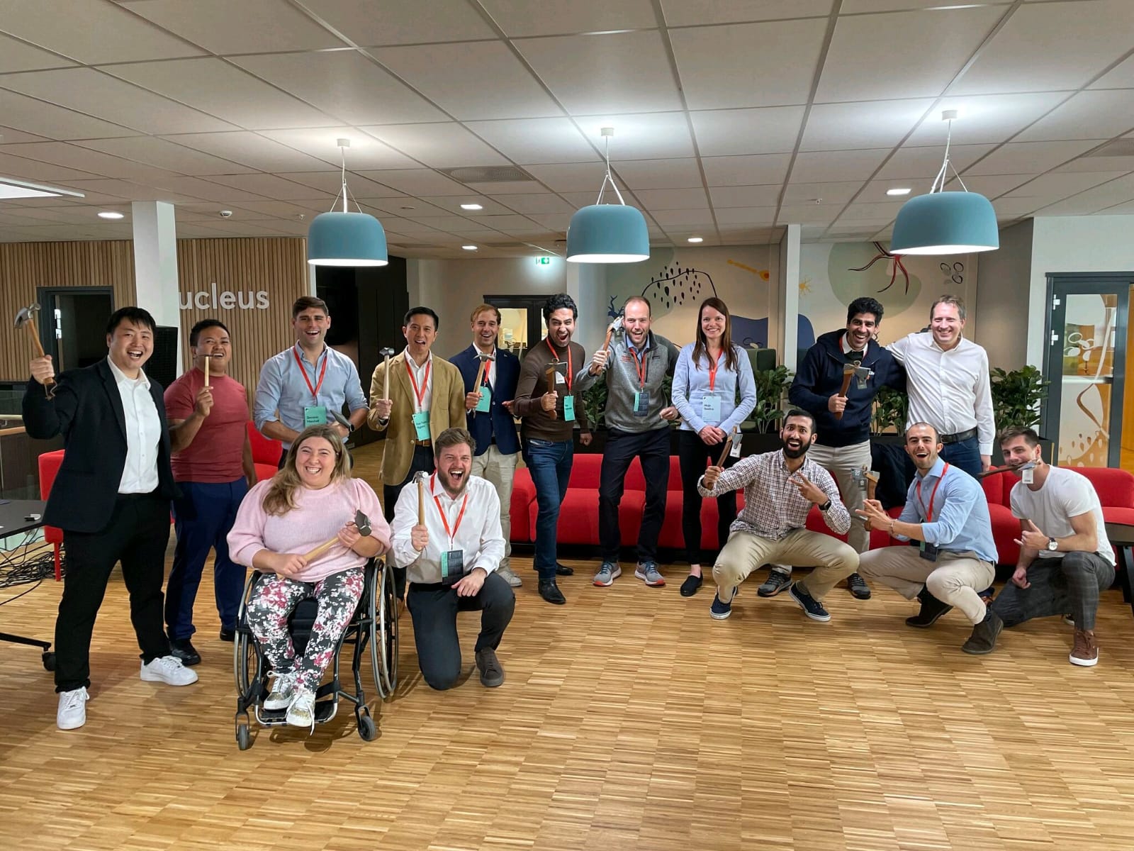 Teams celebrating at a health datathon workshop